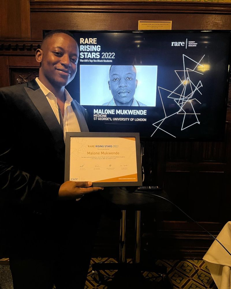 Malone Mukwende receiving the RARE Rising Stars 2022 award